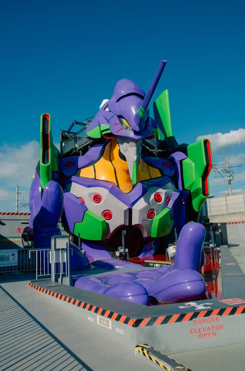 A large inflatable vehicle is on a trailer